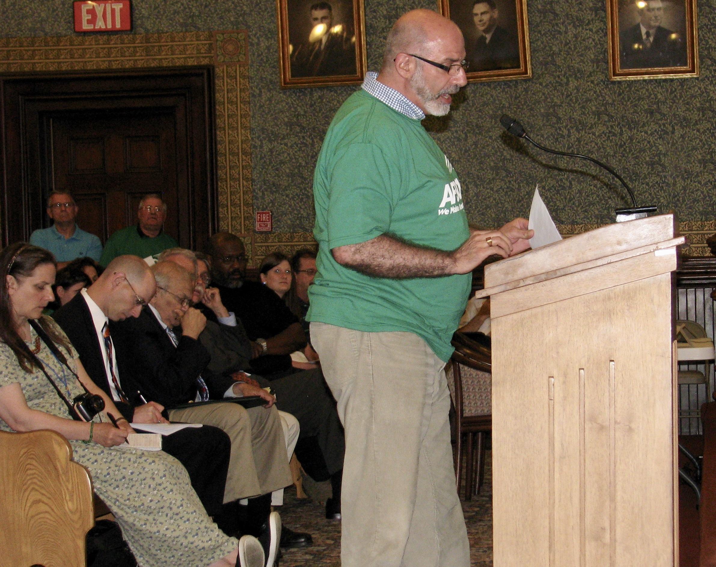 Angelo Callis testified before the Norwich City Council in opposition to deep cuts to city services and staff.