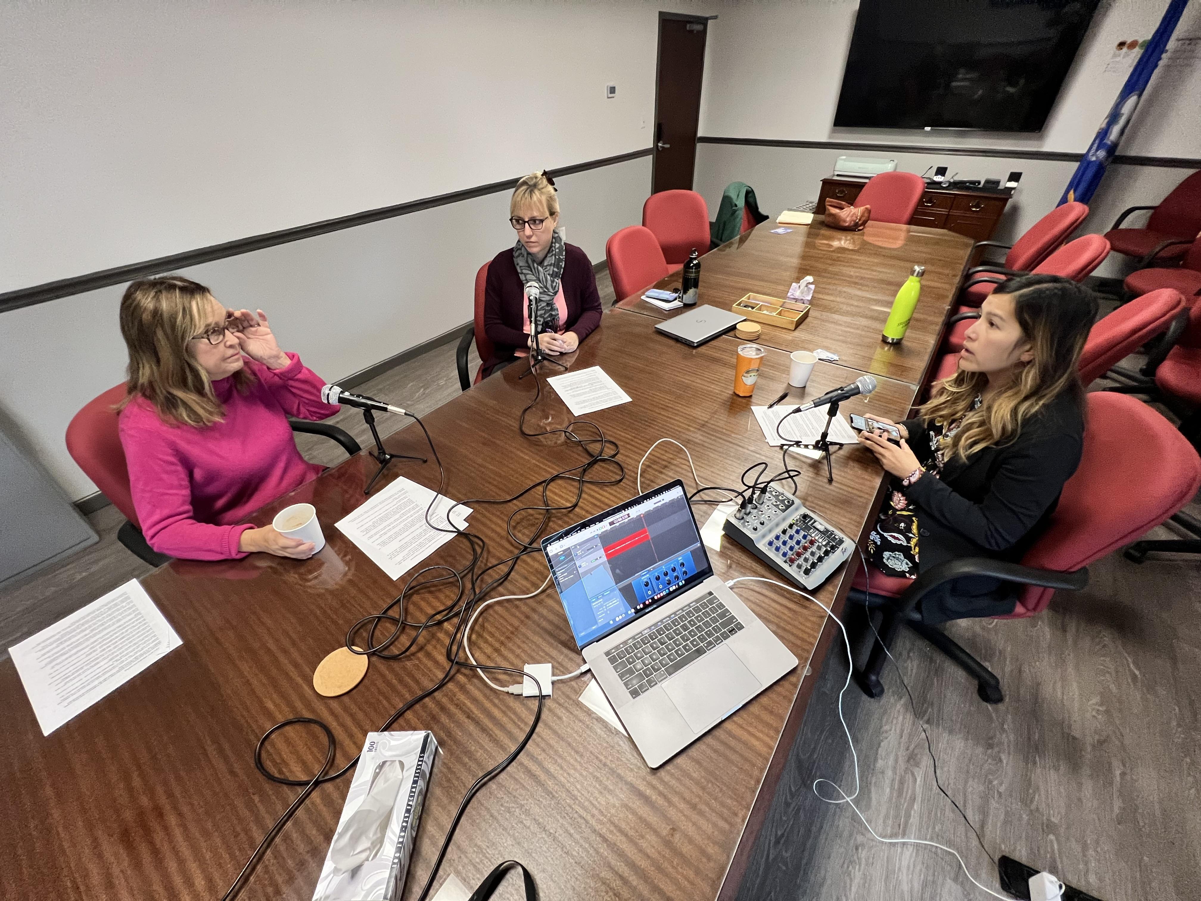 Former Secretary of the State Denise Merrill, left, records a podcast segment with Council 4 Communications Director Renne Hamel, right, and Communications Coordinator Lauren Takores about the early voting ballot measure in New Britain, Oct. 4, 2022. Phot